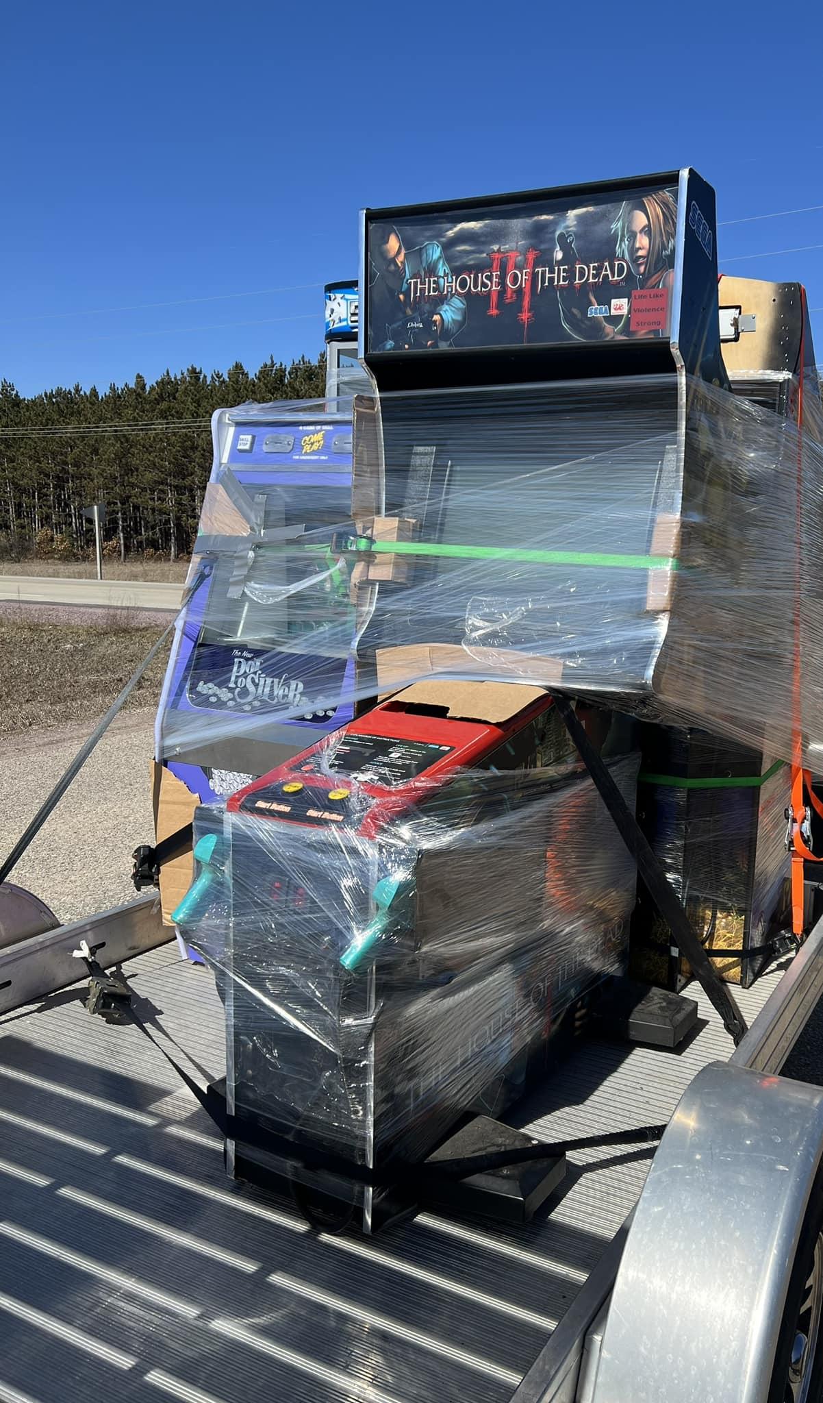 Arcade and amusement cabinets loaded for delivery and installation