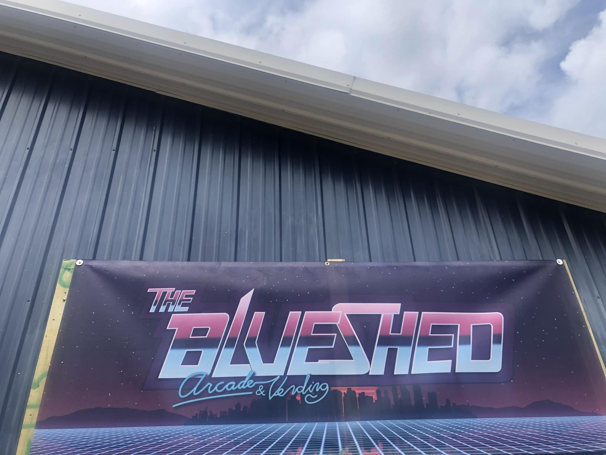 Exterior banner for a local arcade and vending partner venue